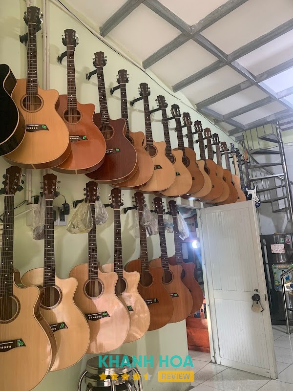 Tiệm Đàn Guitar Quang Tuấn - hình ảnh 3